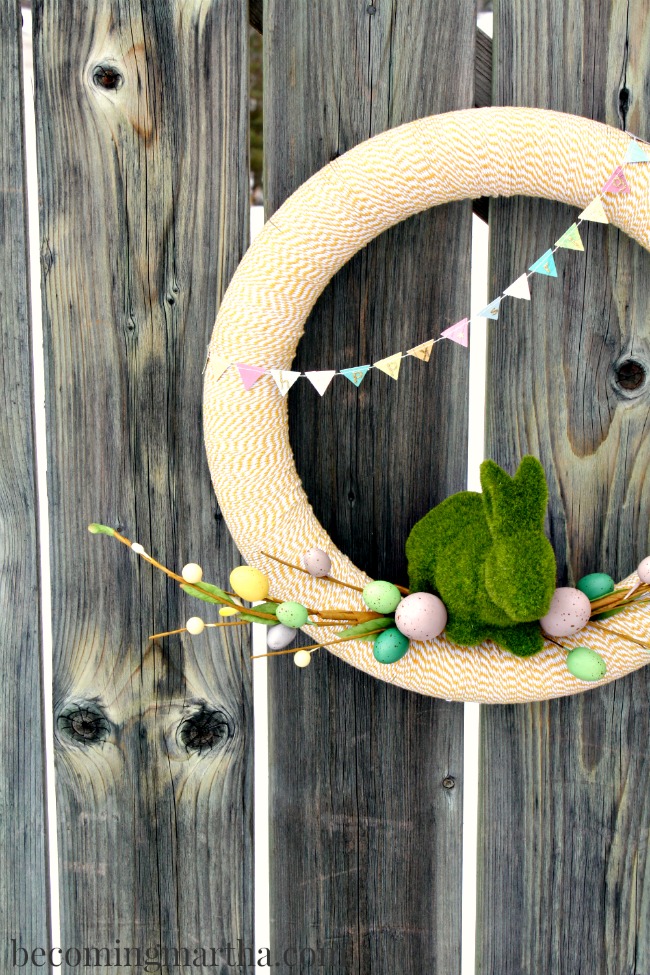 This Baker's Twine Spring Wreath is a breeze to put together thanks to premade Easter decorations!